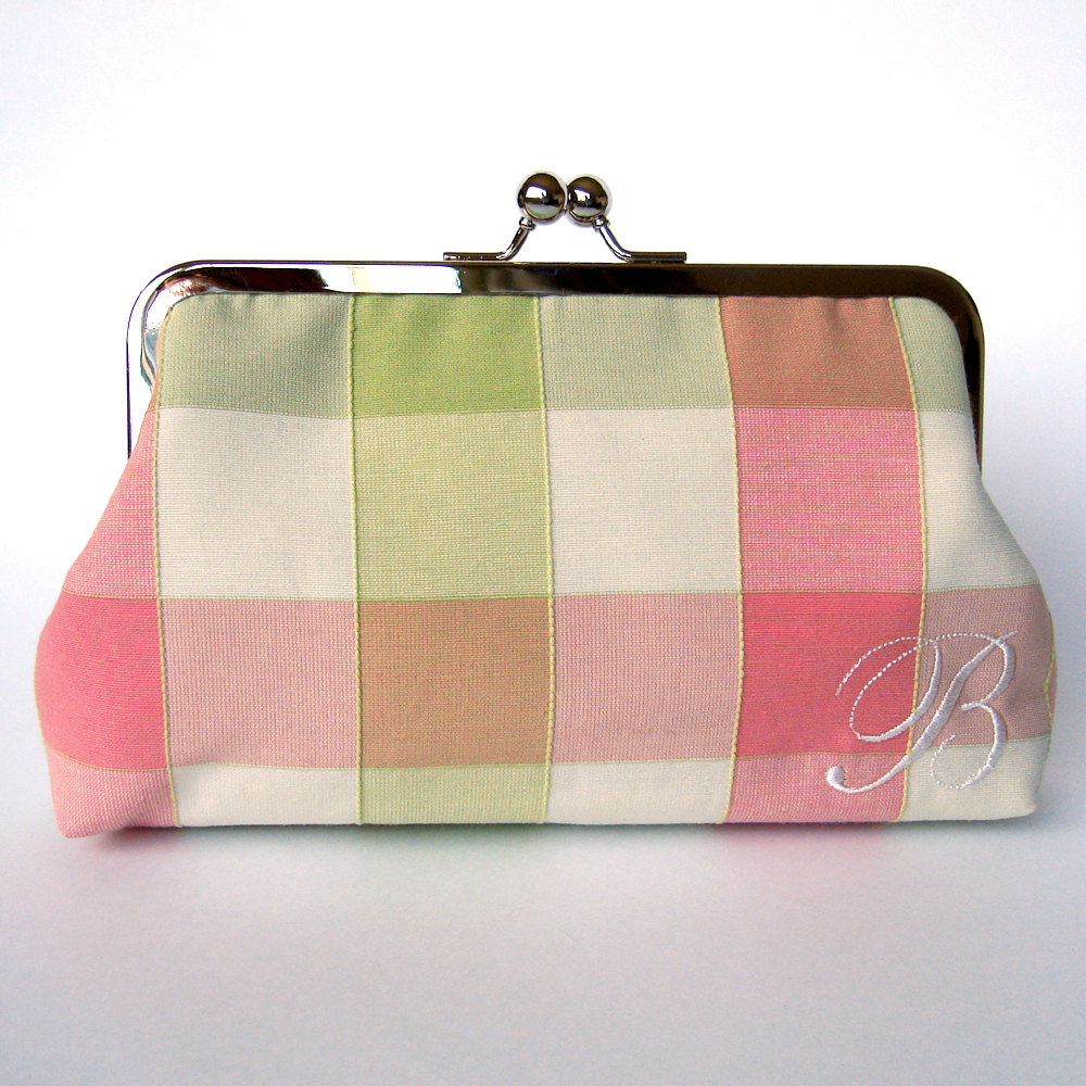 green and pink clutch bag